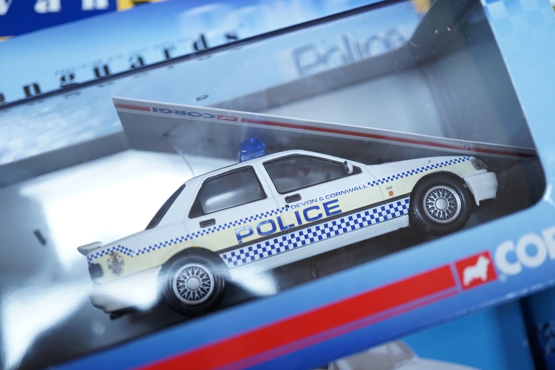 A collection of boxed diecast vehicles, mainly Police related, by Vanguards, Corgi, Cararama, etc. including a Brooklin Models white metal model of a 1972 Vauxhall Ventura (IPV04) in Huddersfield & District (West Yorkshi